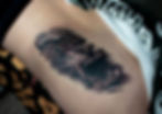 Realistic black and grey tattoo of a roaring tiger, by Dagga