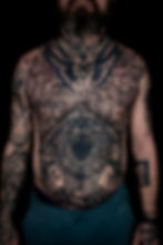 Realistic black and grey full chest and belly tattoo with an Egyptian theme, by Dagga