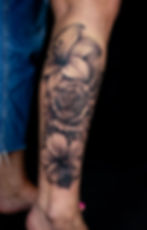 Realistic black and grey floral tattoo (rose and lily), by Dagga