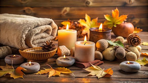 cozy spa room Cozy fall setting with candles, warm blankets, and massage stones.