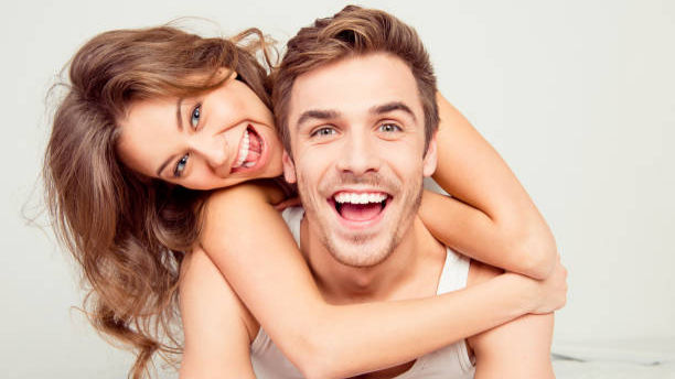 A photo of a happy couple exuding connection and confidence.