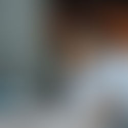 A black female entrepreneur stressing about her workload looking to relieve herself through the techniques offered by Succeed and Elevate.