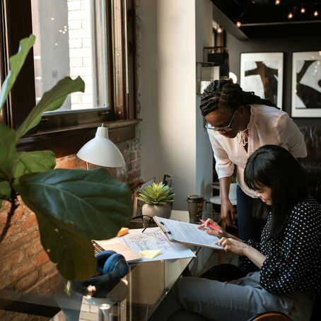 An entrepreneur is learning how to network using Succeed and Elevate's practical networking strategies.