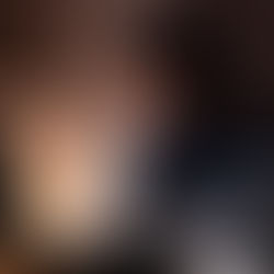 An entrepreneur is reading a Succeed and Elevate blog to help him overcome imposter syndrome so that he can know how to build confidence when operating in his business.