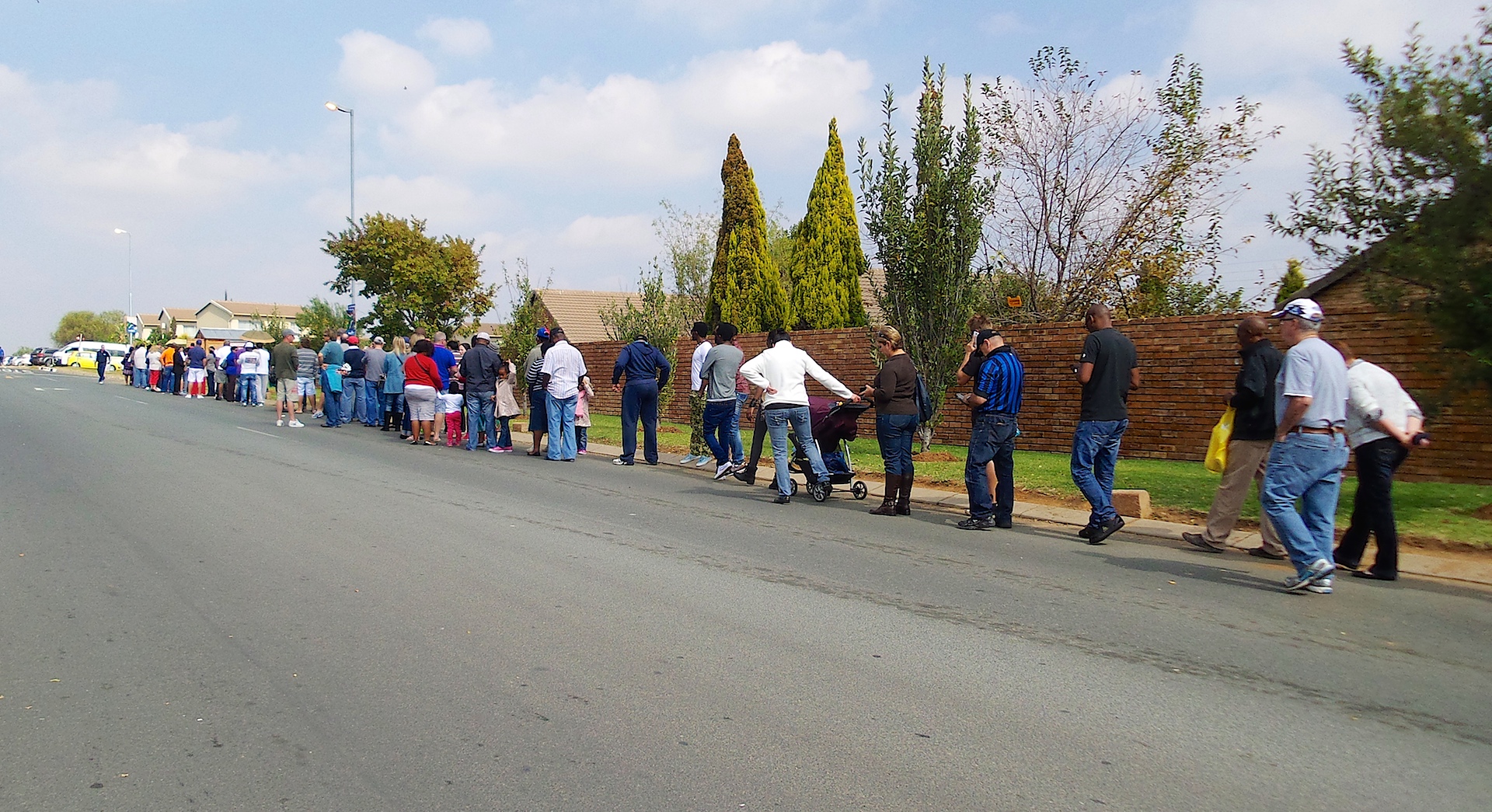A long queue of voters outside a polling place in South Africa in 2014.