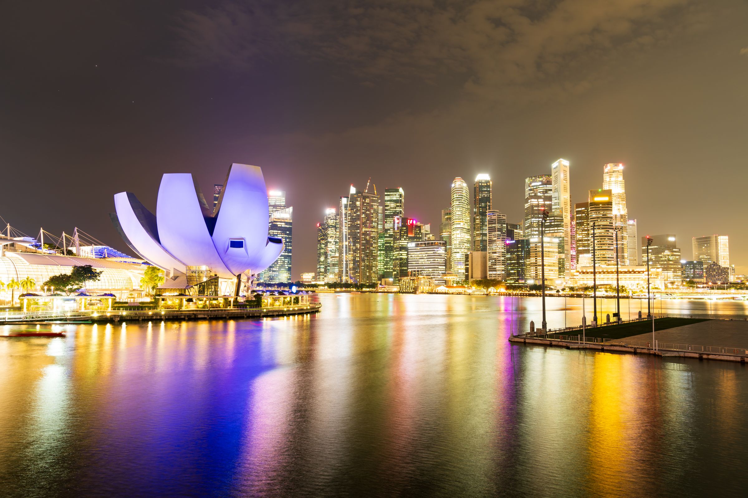 Marina Bay, Singapore, at night, with the ArtScience Museum and the financial district.