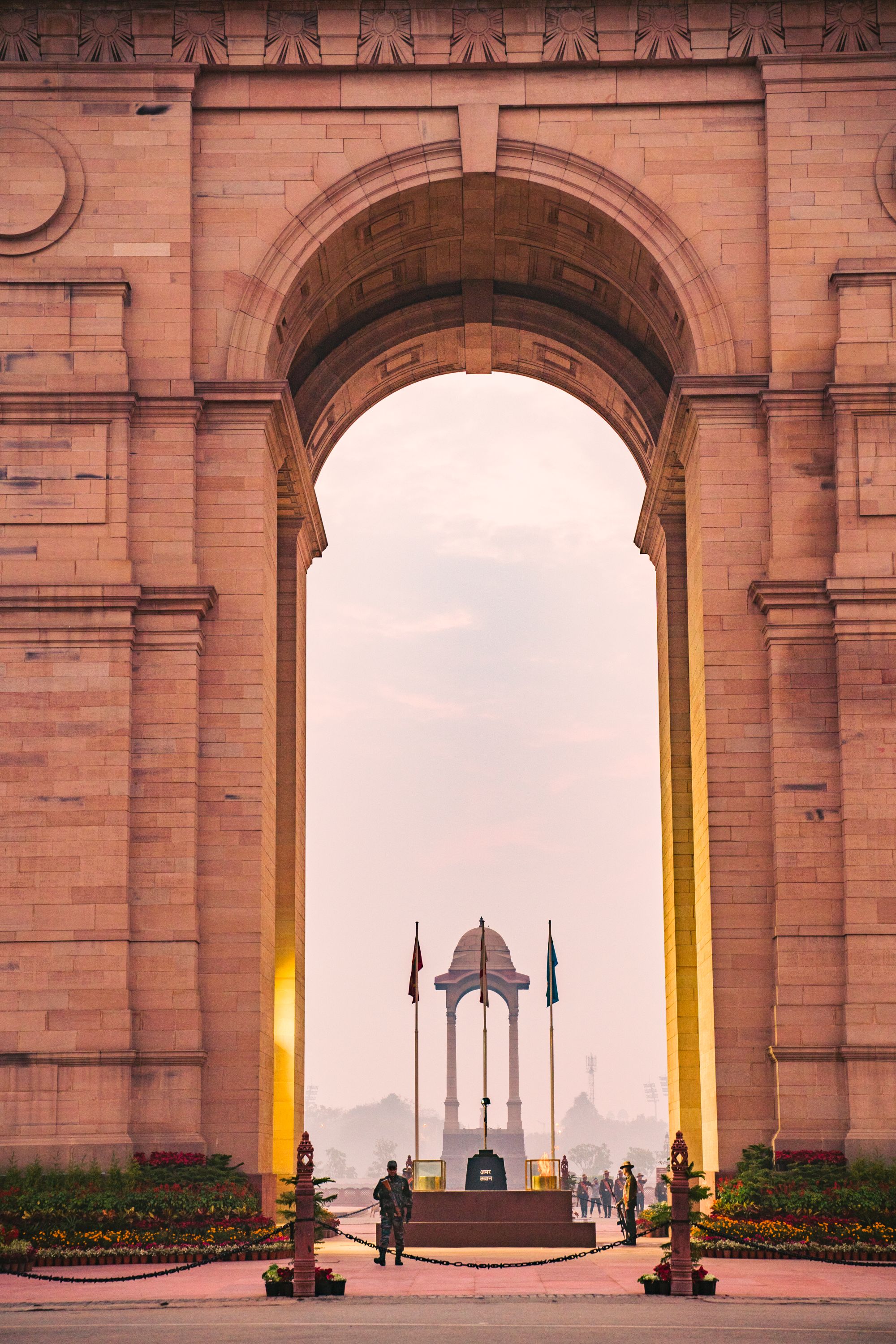 The India Gate through its arch, New Delhi.