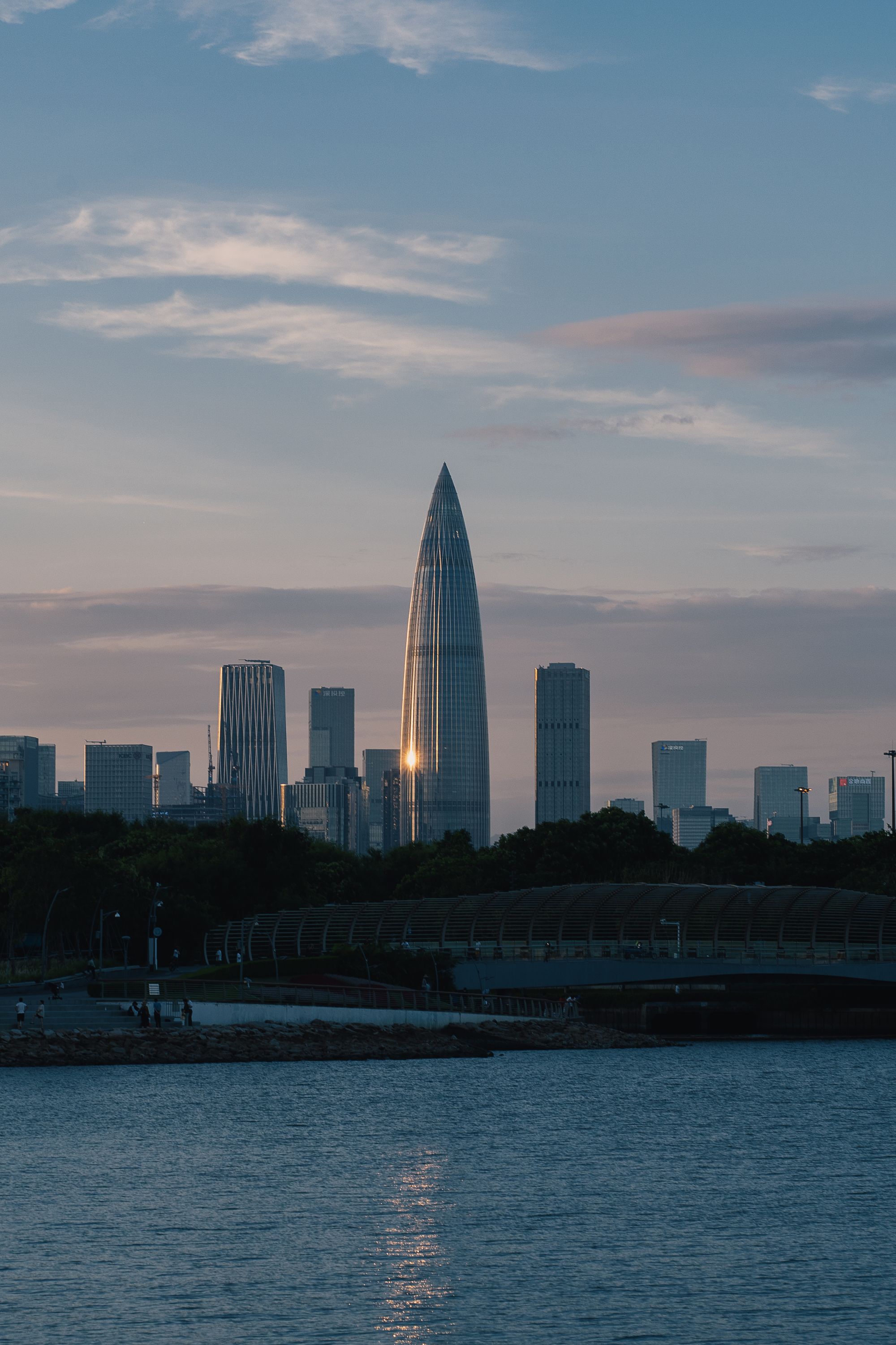 Shenzhen skyline with the China Resources Headquarters tower at sunset.