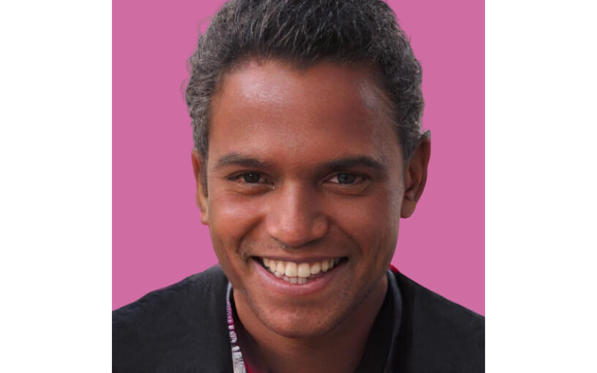 A face-swap catalogue sample: a portrait against a single-colour background, the kind of target image the face-swap surface swaps a second face into
