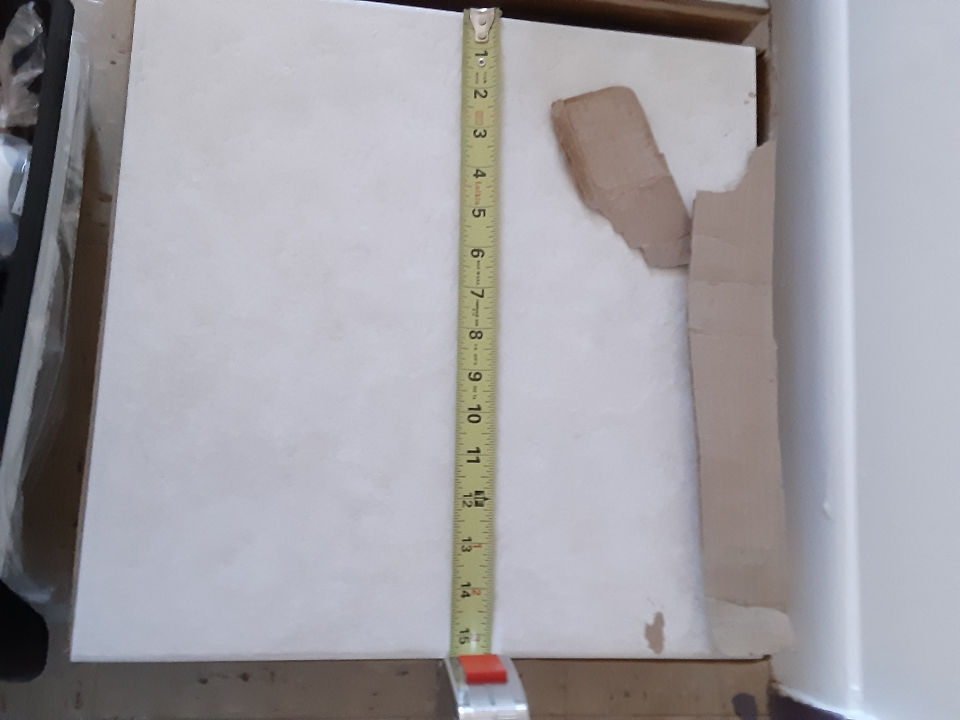 01. Box of 15 inch ceramic tiles - $4