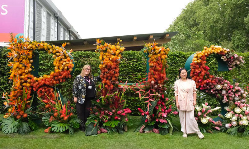 Rachel and Xue at the 2025 RHS Chelsea Flower Show, where they designed the iconic RHS letters
