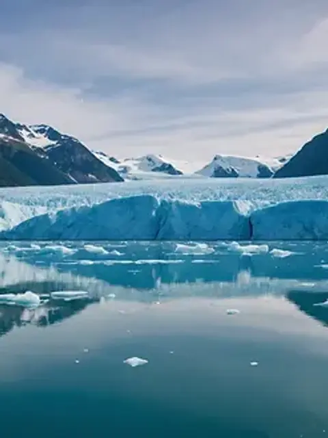 Wide angle view of Bear Glacier with its striking blue ice