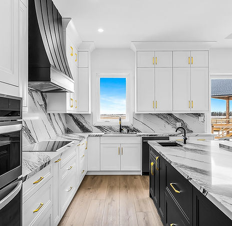 Custom black and white kitchen with shaker cabinets and modern design elements – built by G&H Cabinetry, serving Mississauga,