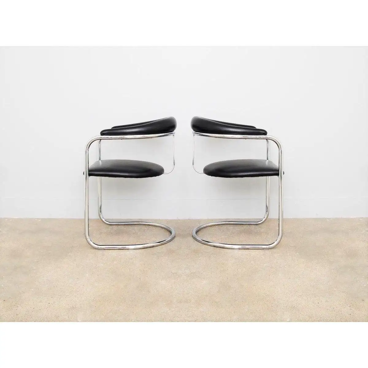 Four Black and Chrome Dining Chairs by Anton Lorenz for Thonet