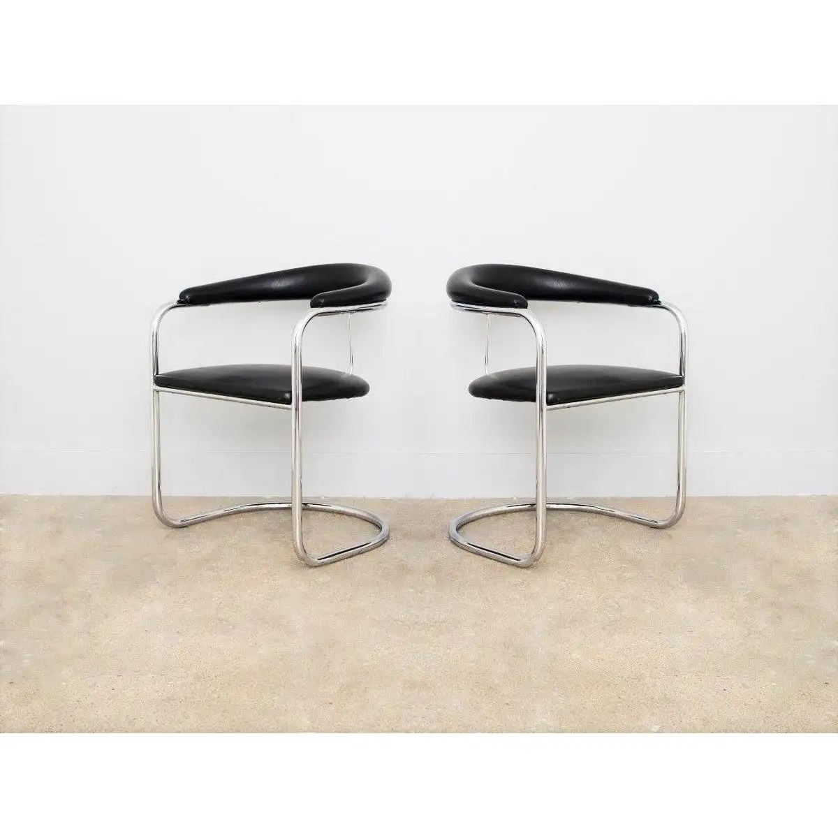 Four Black and Chrome Dining Chairs by Anton Lorenz for Thonet