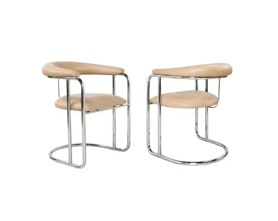 Thumbnail: Twelve Sleek Chrome Dining Chairs by Anton Lorenz for Thonet