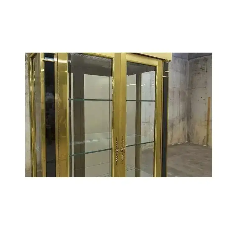 Thumbnail: Two Neoclassical Brass Vitrine Cabinets by Mastercraft