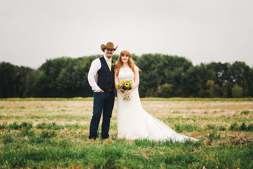 Newlywed portrait at Bassmead Manor Barns