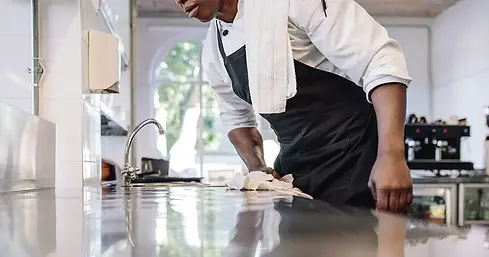 chefcleaningkitchen.webp