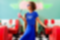 retro-t-shirt-mockup-featuring-a-joyful-woman-dancing-while-holding-a-milkshake-m15498-r-e