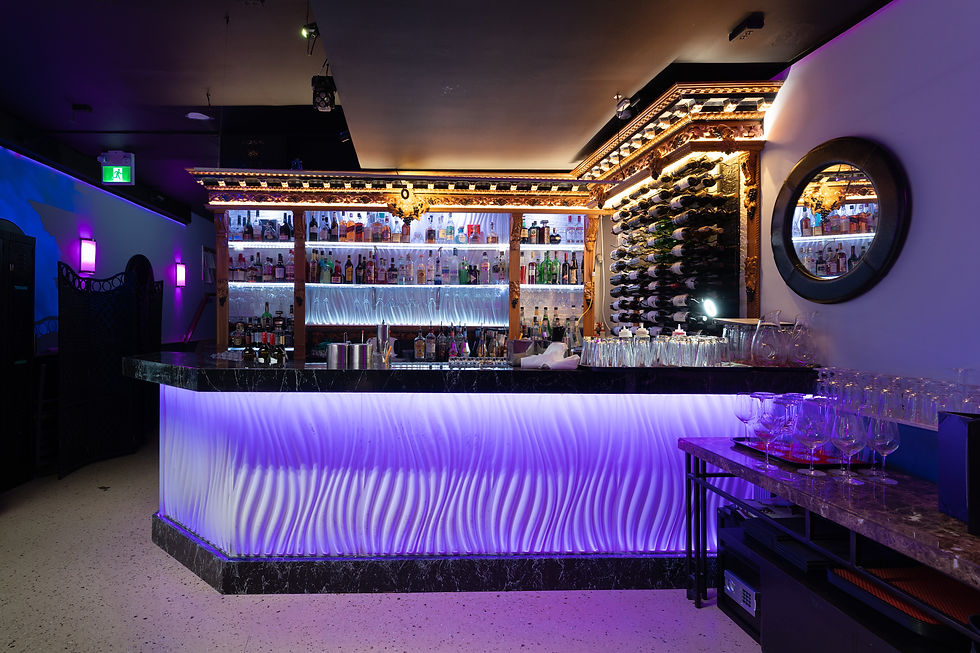 Eye-level view of stylish lounge interior with ambient lighting and elegant seating