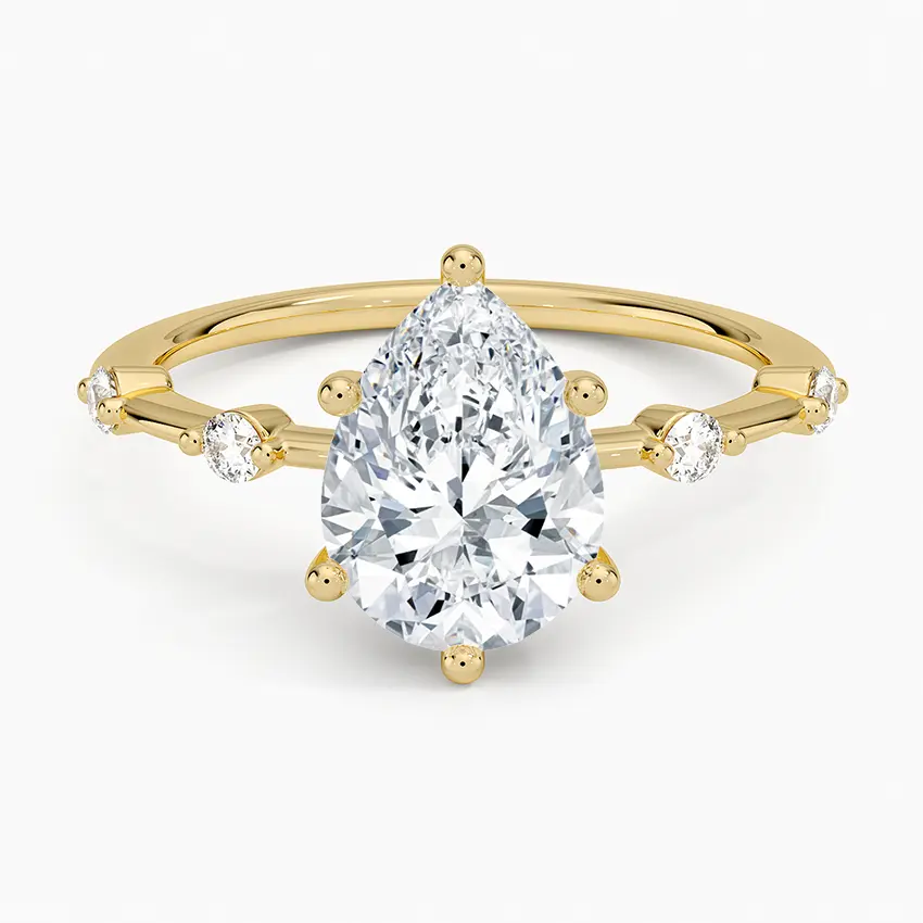 Miniature : Raelynn - 14k Pear Shaped Center with Round Studded Band