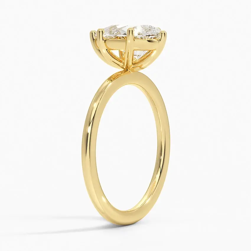 Miniature : Pixie - 14k Pear Shaped Flush Set Solitaire