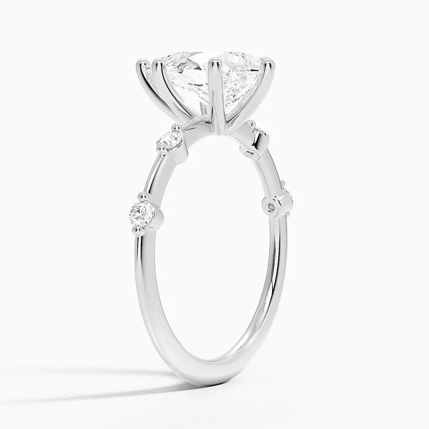 Miniature : Raelynn - 14k Pear Shaped Center with Round Studded Band