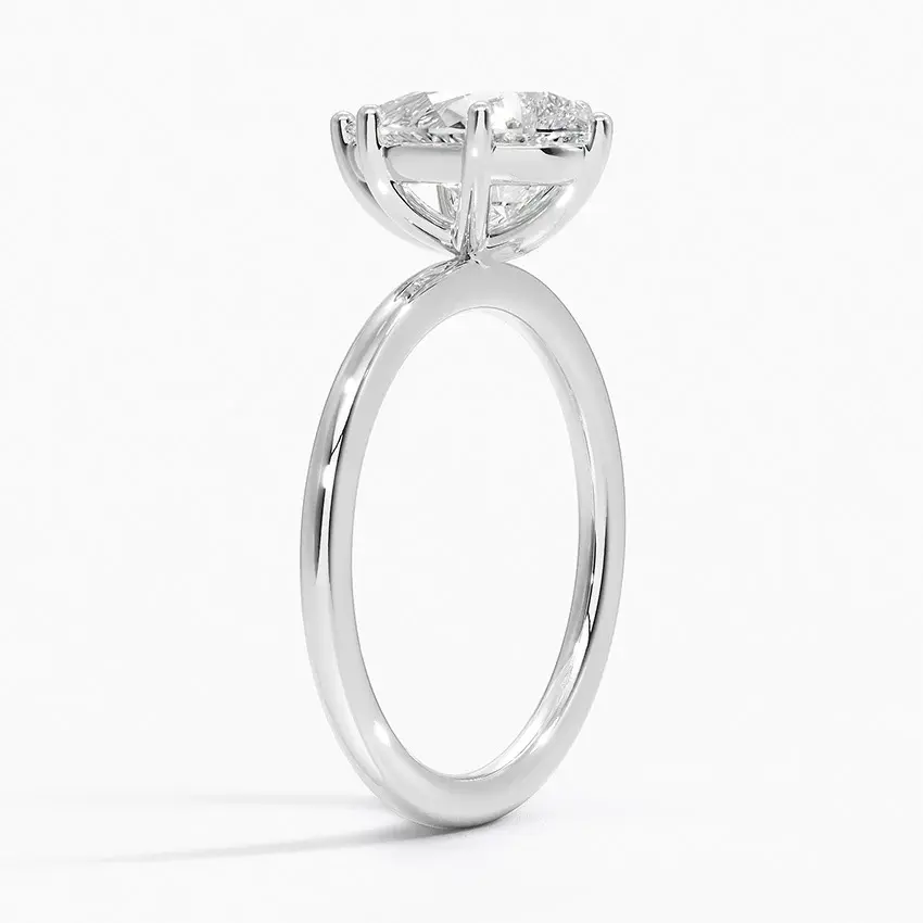 Miniature : Pixie - 14k Pear Shaped Flush Set Solitaire