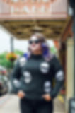cool woman in skull knit sweater