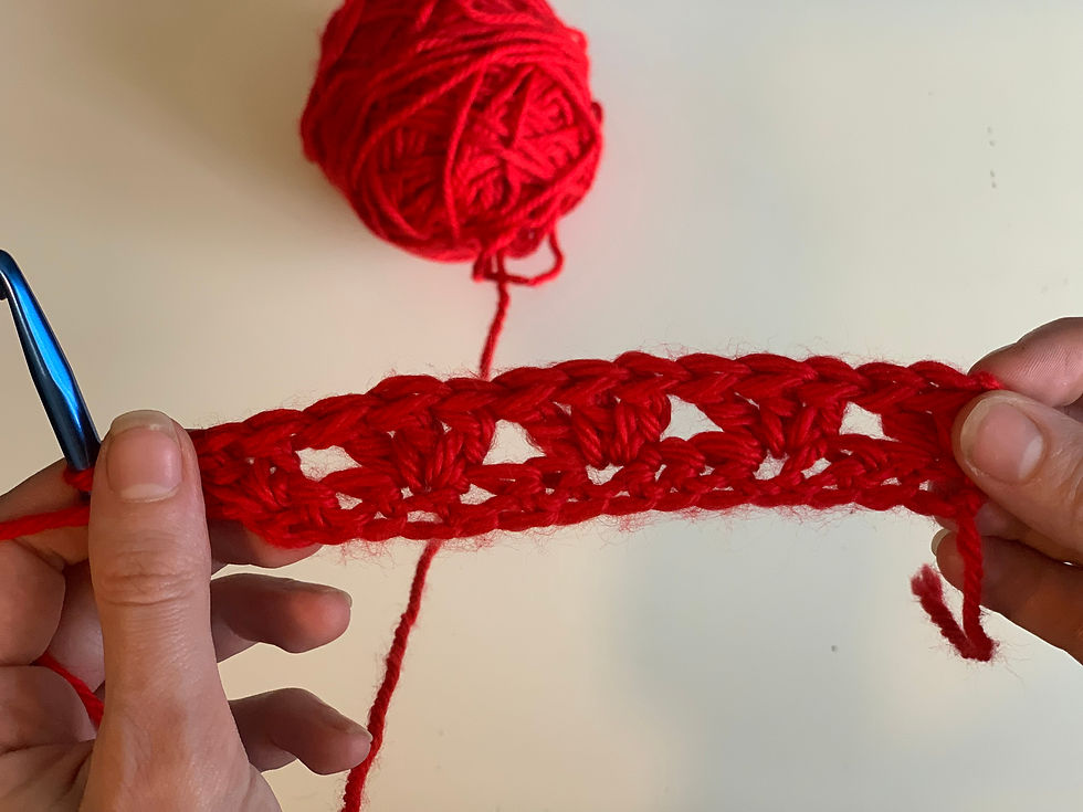 red yarn sample crochet of the granny stitch