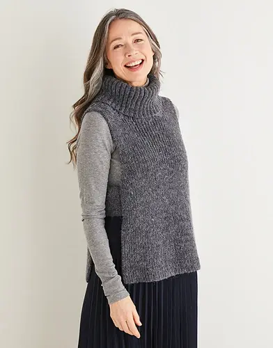 older woman modelling tunic style vest