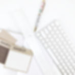 desk with keyboard and swatch samples