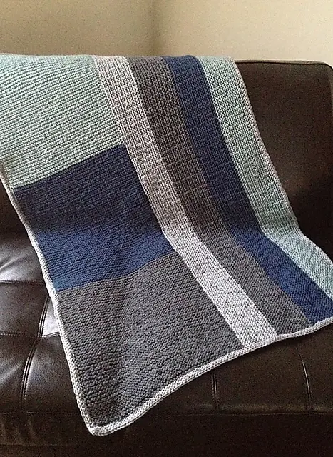 knit baby blanket, blue shades blocks and stripes