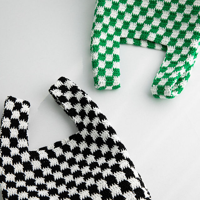 black/white, and green/white crochet tote bags