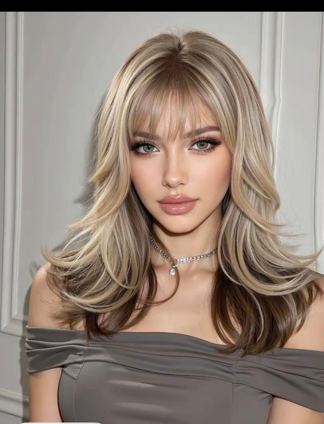 Elequent blonde/brown highlights