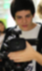Camper frames a shot with a camera