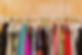 Colorful clothes hanging on a rack