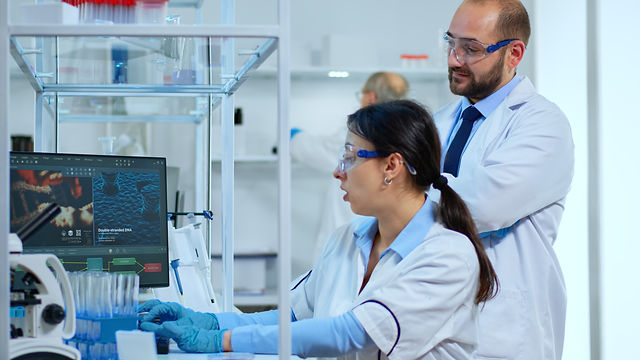 research-scientists-working-on-computer-