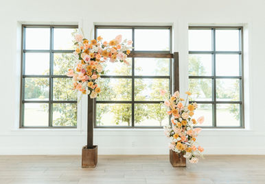 Wedding ceremony rustic floral alter decor