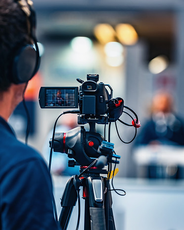 cameraman-recording-event-at-media-press-conferenc-2024-10-18-08-26-30-utc.jpg