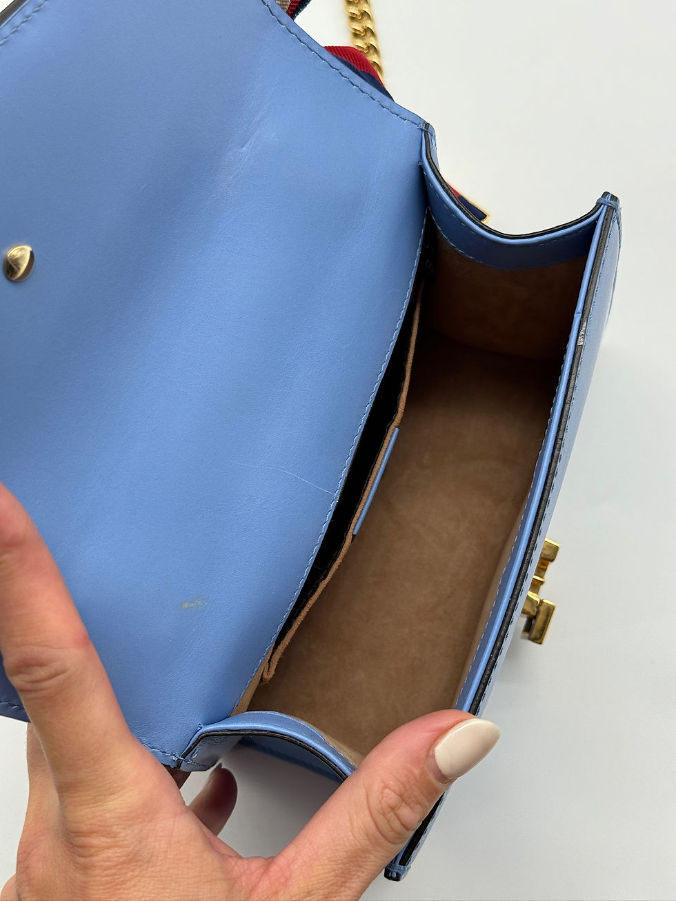 Thumbnail: Gucci Mini Slyvie Bag.
