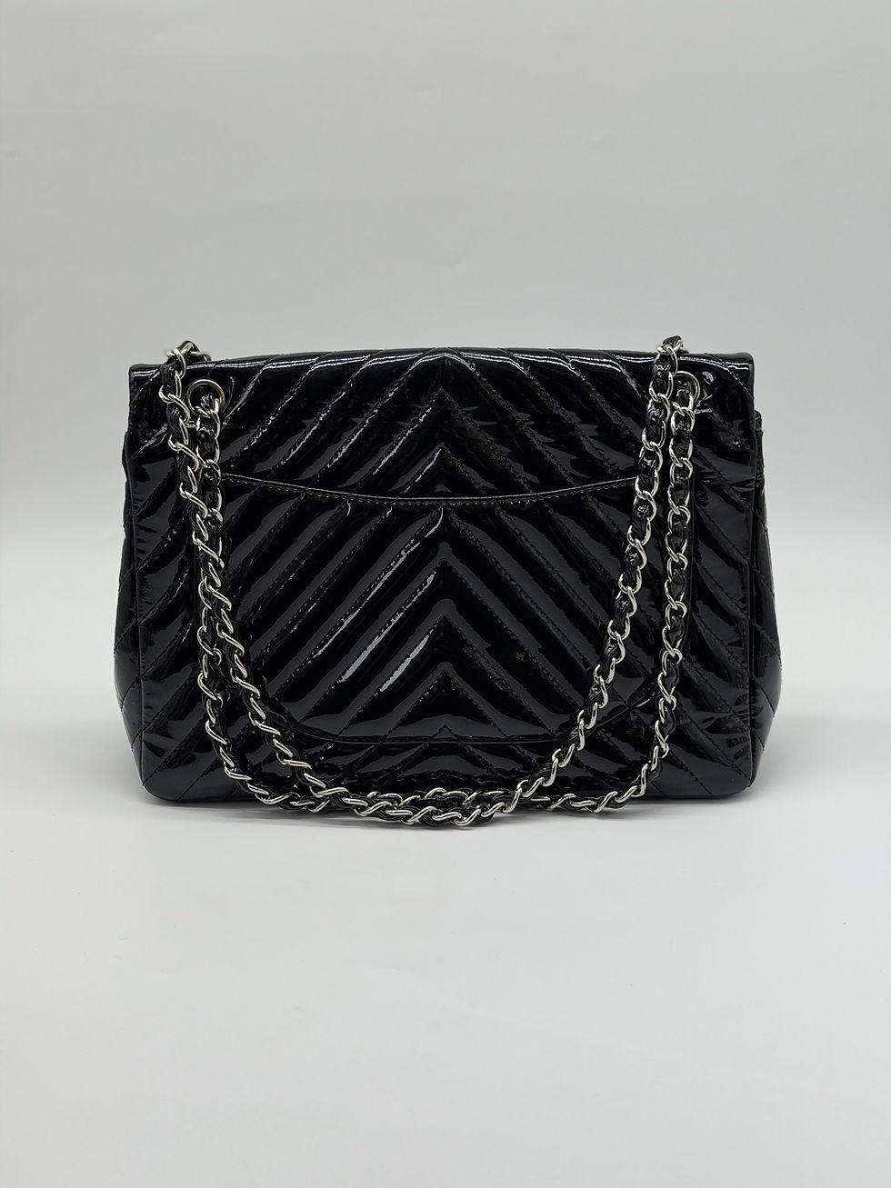 Thumbnail: Chanel Black Patent Maxi Chevron Flap Bag.