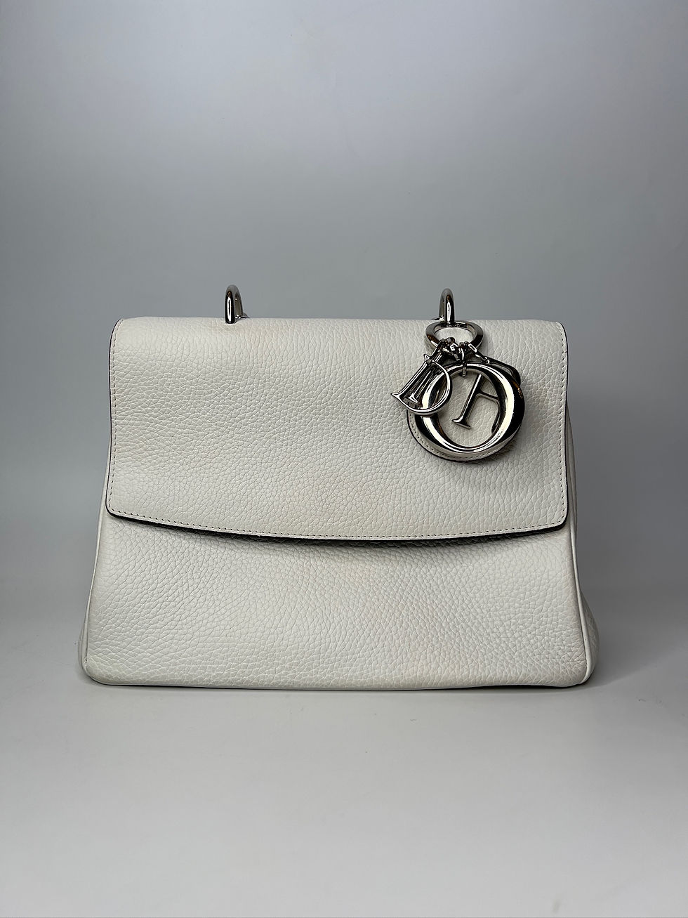 Thumbnail: Christian Dior Be Dior Pebbled Bag.