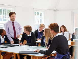 A male teacher with students