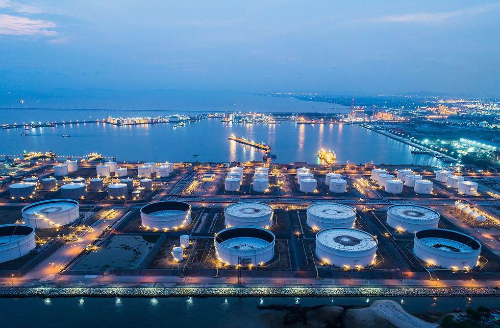 Aerial view or top view night light oil terminal is industrial facility for storage of oil