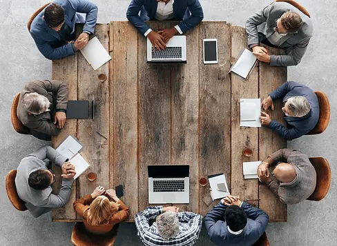 kenjallen_realistic_photo_of_a_group_of_SaaS_executives_sitting_67dd17e2-837e-4f50-adc9-4d