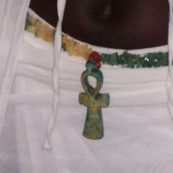 Ankh necklace as belt detail