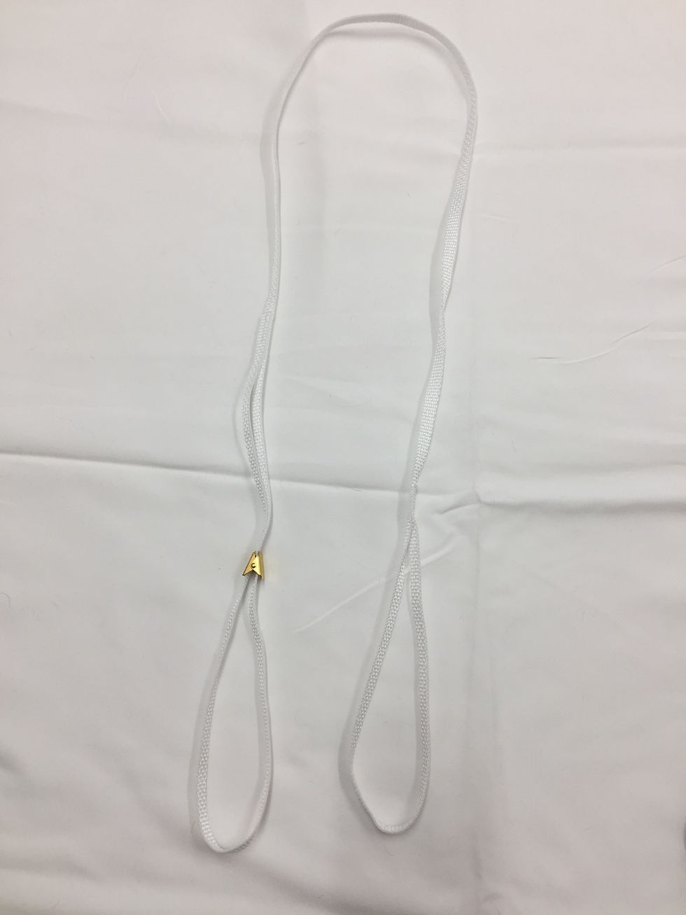 Thumbnail: White background with two clear tubes, a small gold bead present.