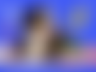 dog with a large bowl of spinach